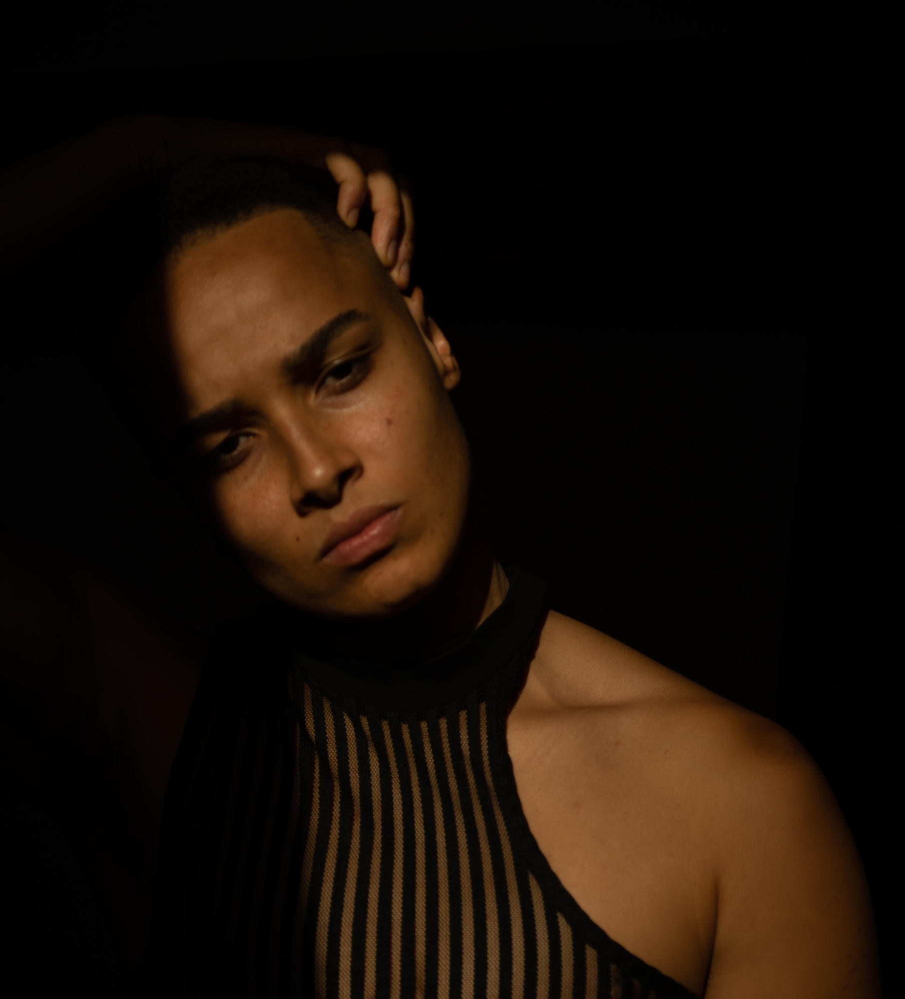 Portrait of Balla-Gabriele, founder of Equipped and Resourced, centered on face and upper torso.